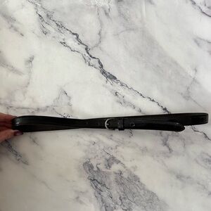 Thin black leather belt